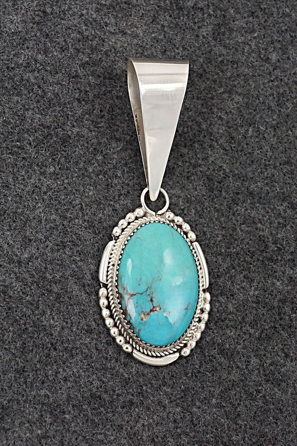 Turquoise & Sterling Silver Pendant - Kenny Calavaza