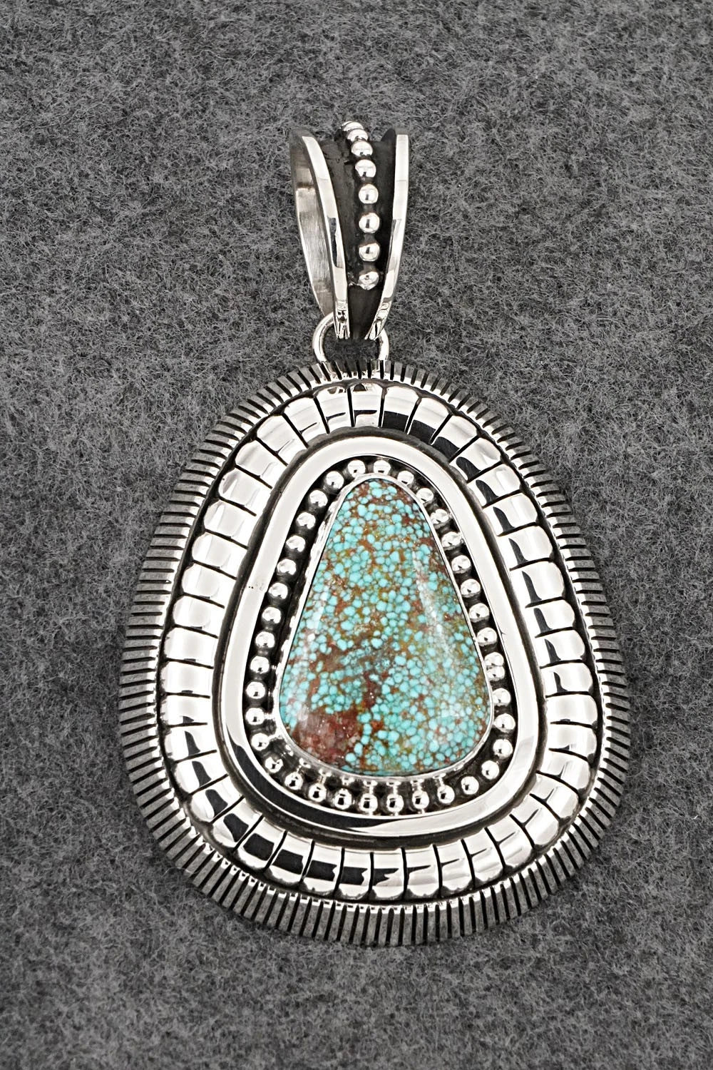 Turquoise and Sterling Silver Pendant - Jonathan Nez