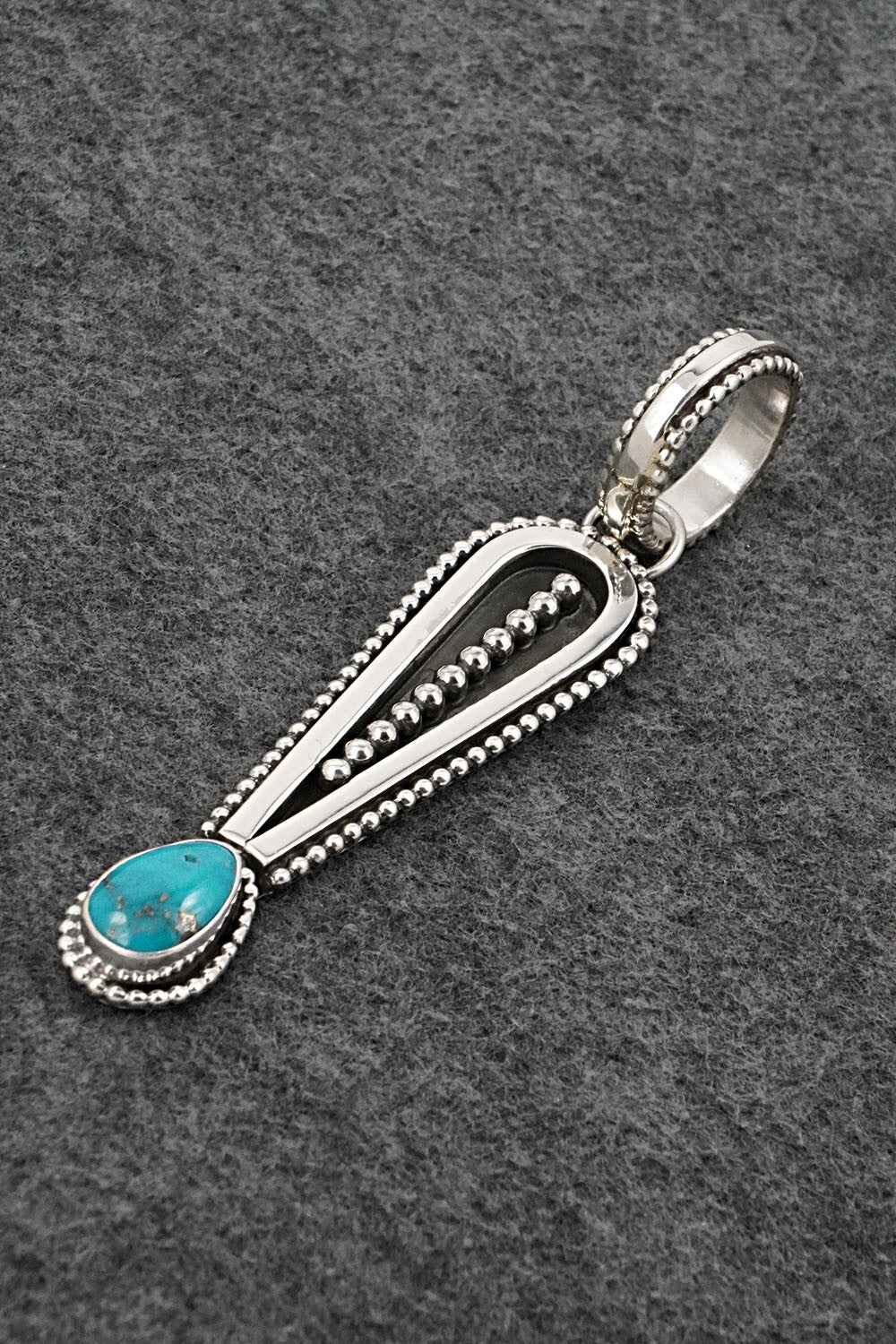 Turquoise & Sterling Silver Pendant - Jonathan Nez