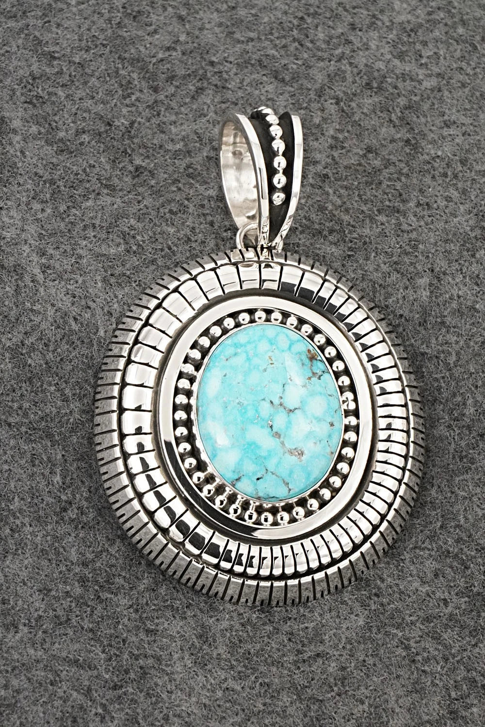 Turquoise and Sterling Silver Pendant - Jonathan Nez