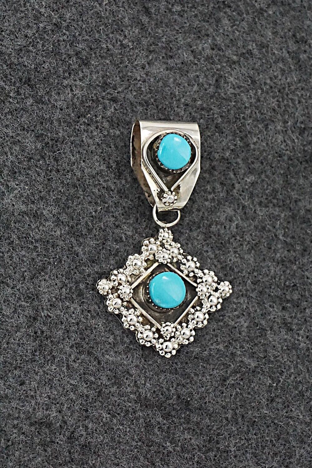 Turquoise and Sterling Silver Pendant - Verdie Booqua