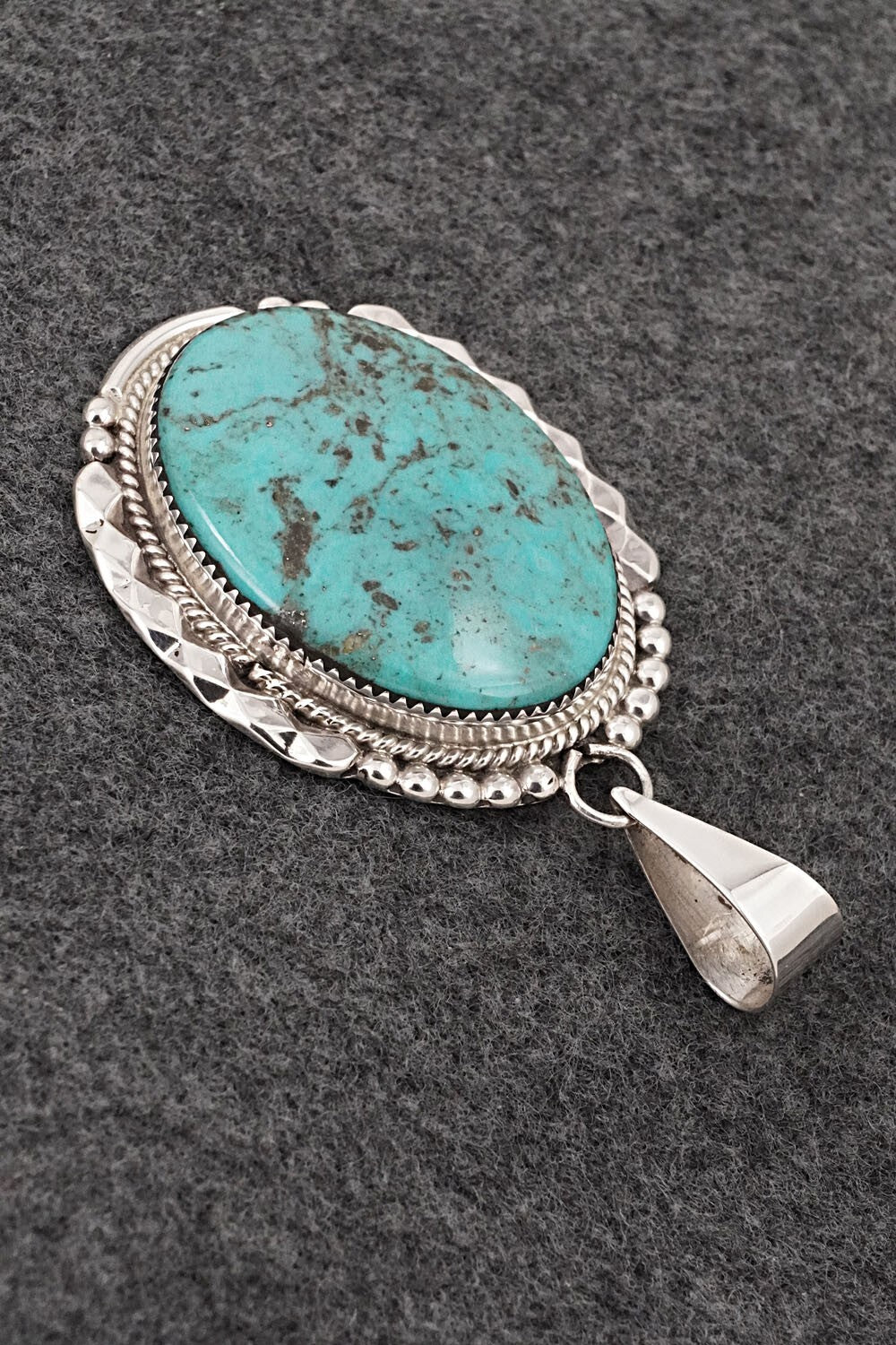 Turquoise & Sterling Silver Pendant - Kenny Calavaza