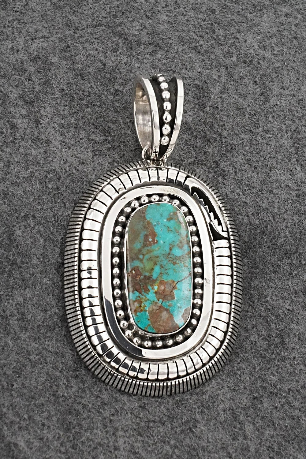 Turquoise and Sterling Silver Pendant - Jonathan Nez