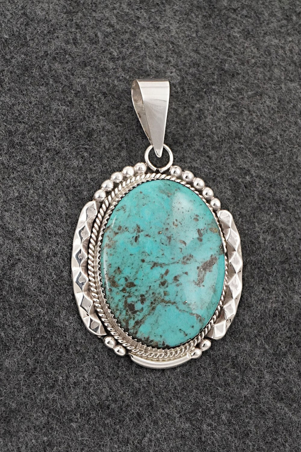Turquoise & Sterling Silver Pendant - Kenny Calavaza