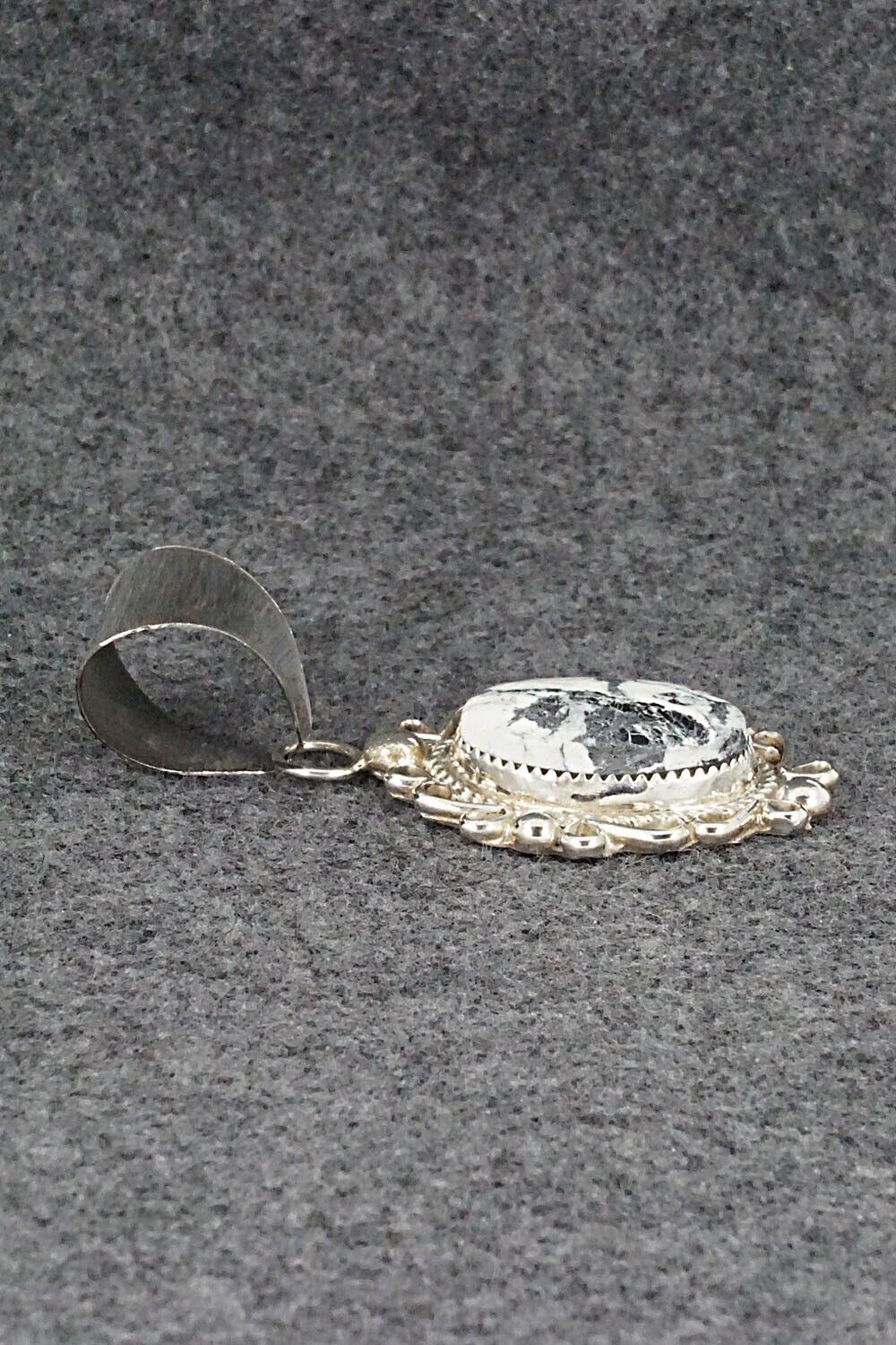 White Buffalo & Sterling Silver Pendant - Donavan Nez
