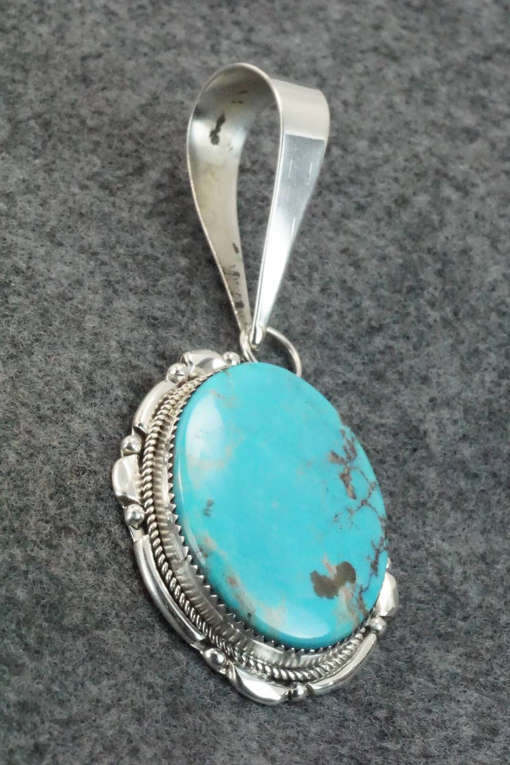 Turquoise & Sterling Silver Pendant - Kenny Calavaza
