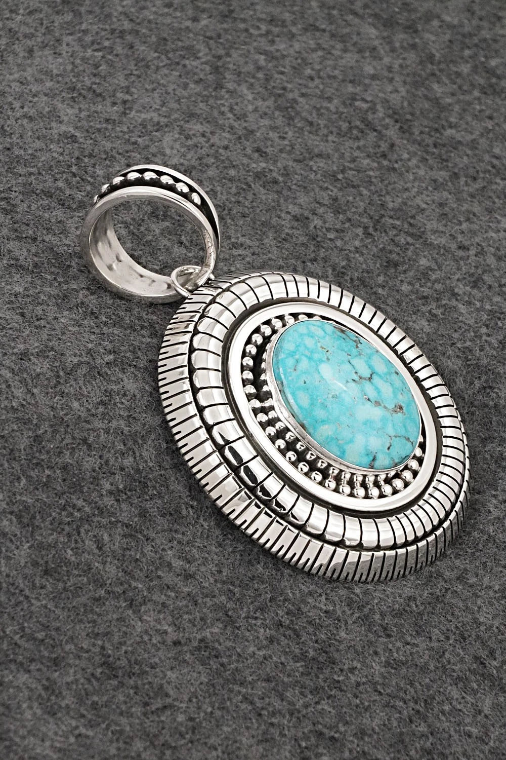 Turquoise and Sterling Silver Pendant - Jonathan Nez