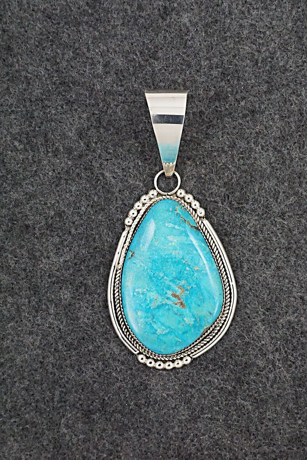 Turquoise & Sterling Silver Pendant - Kenny Calavaza