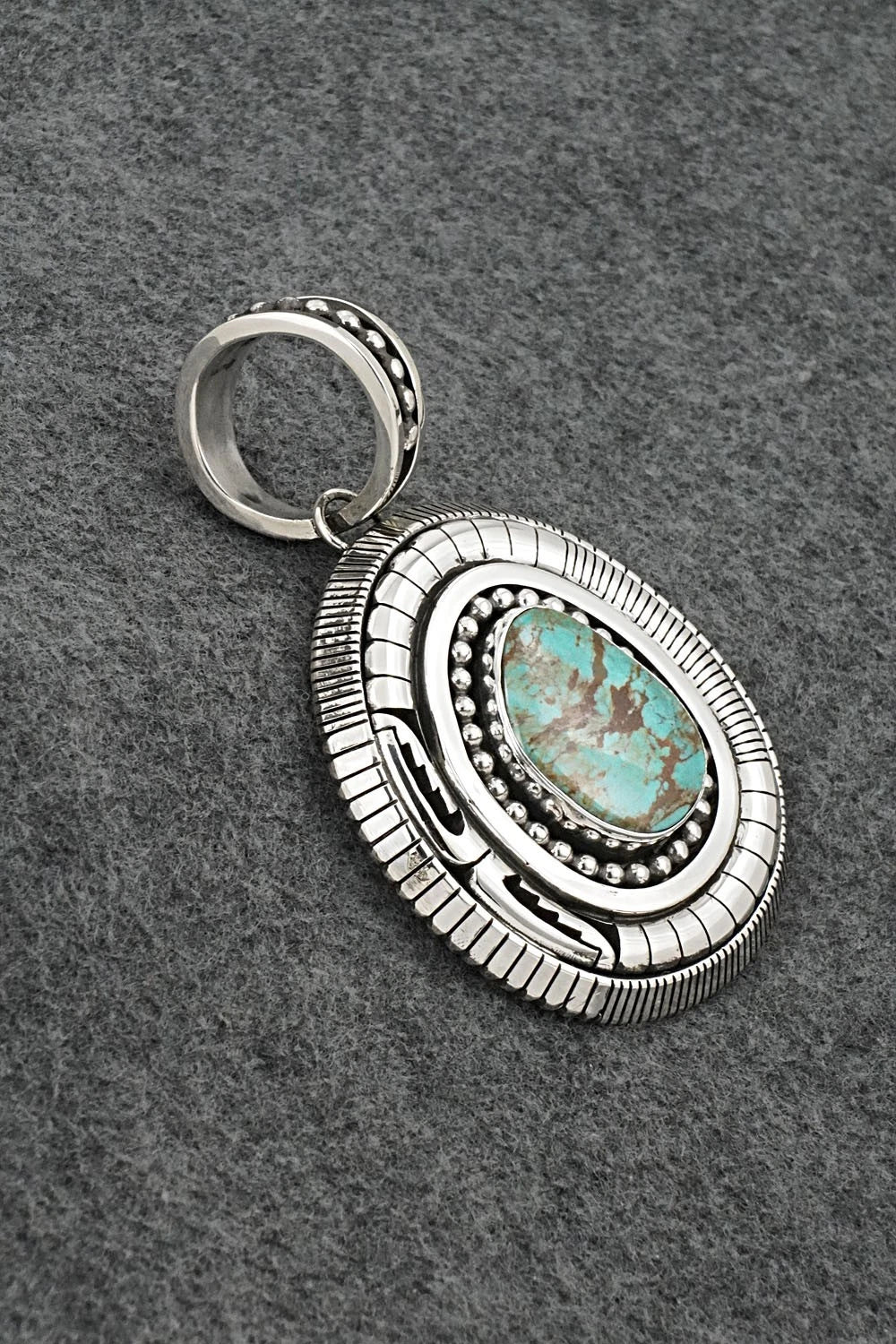 Turquoise and Sterling Silver Pendant - Jonathan Nez