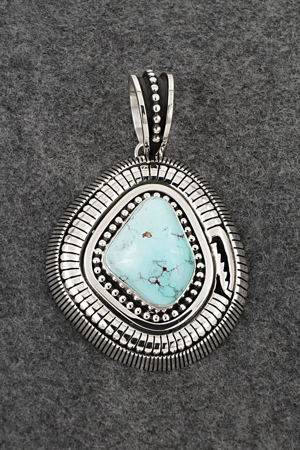 Turquoise and Sterling Silver Pendant - Jonathan Nez