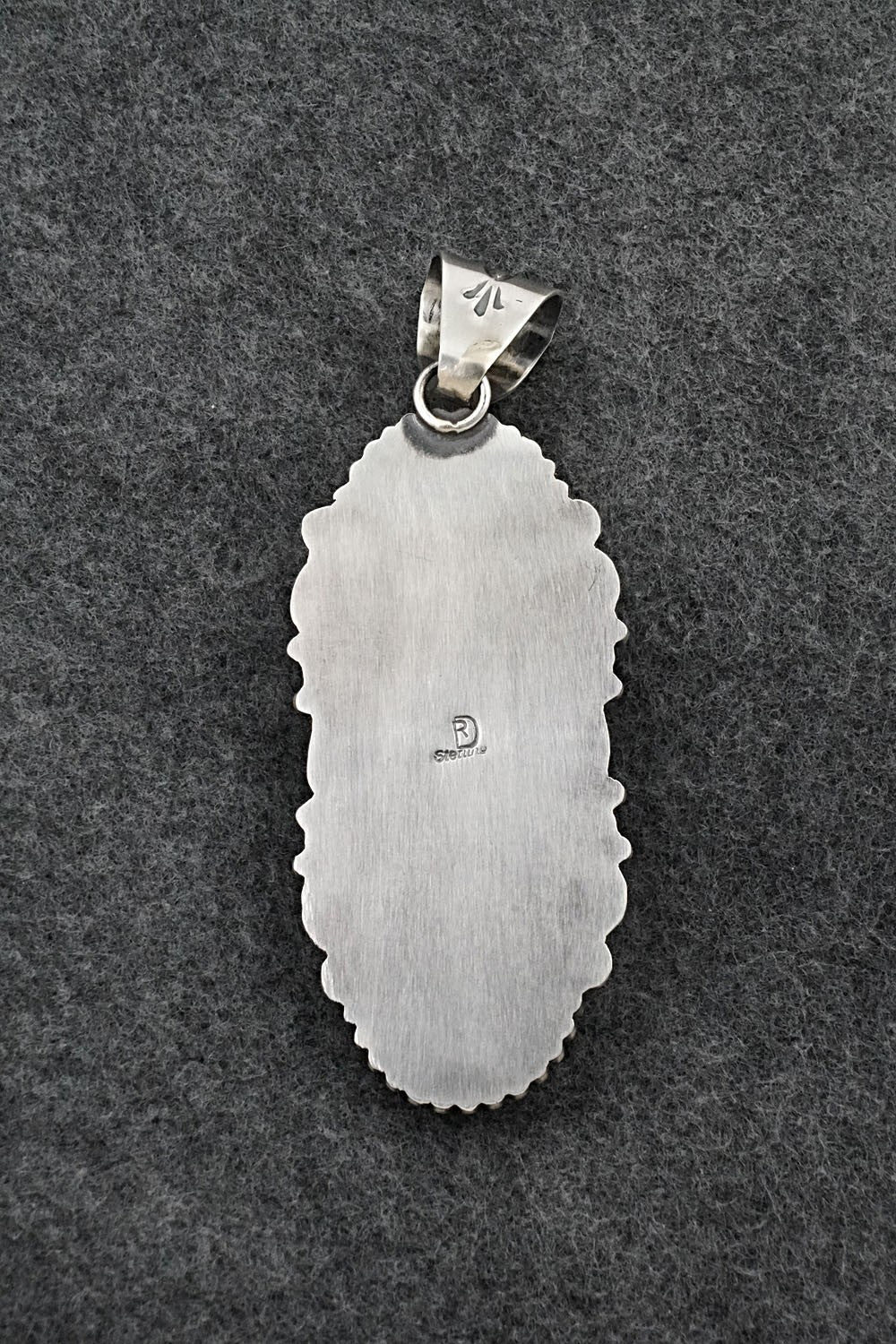 White Buffalo & Sterling Silver Pendant - Raymond Delgarito
