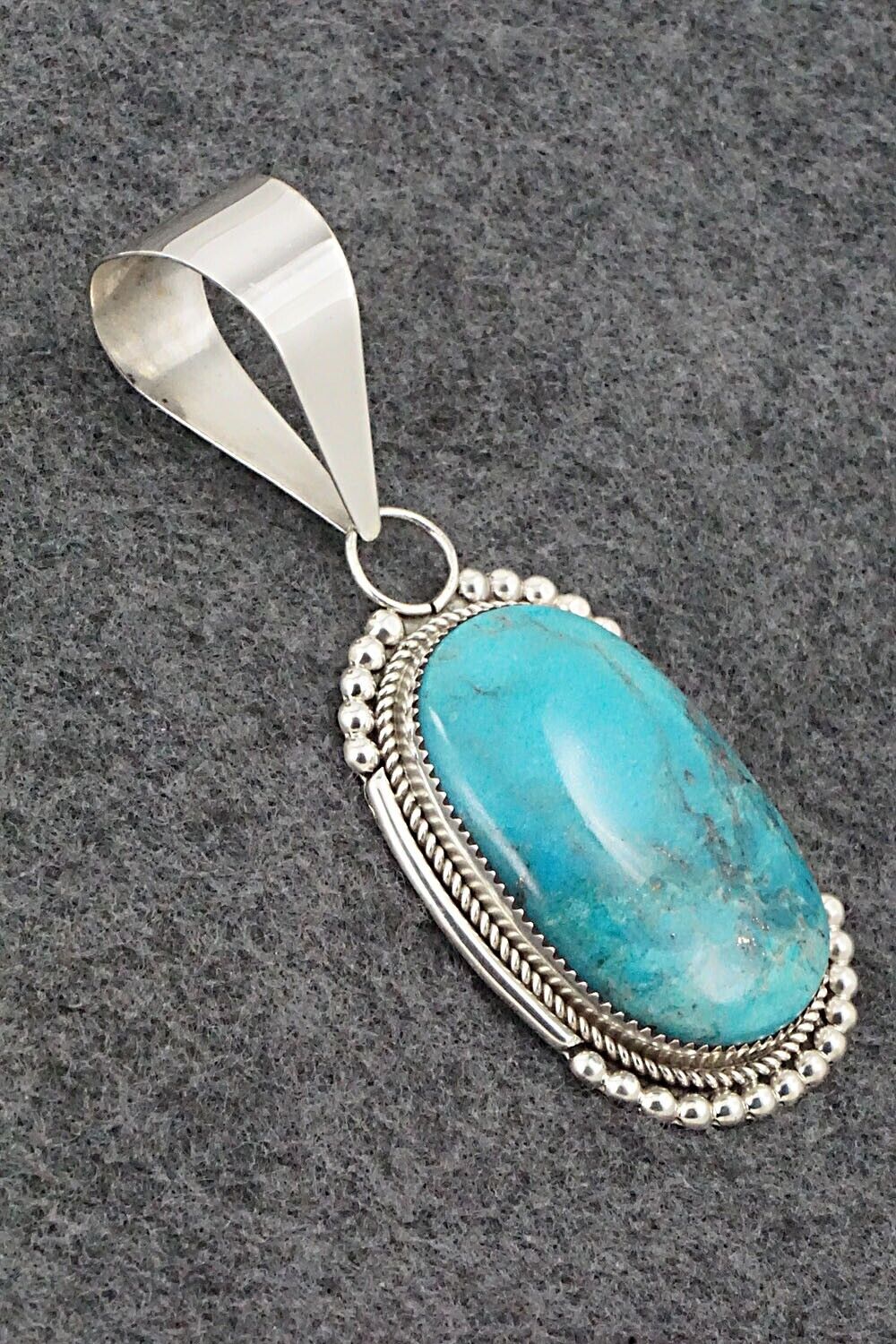 Turquoise & Sterling Silver Pendant - Kenny Calavaza