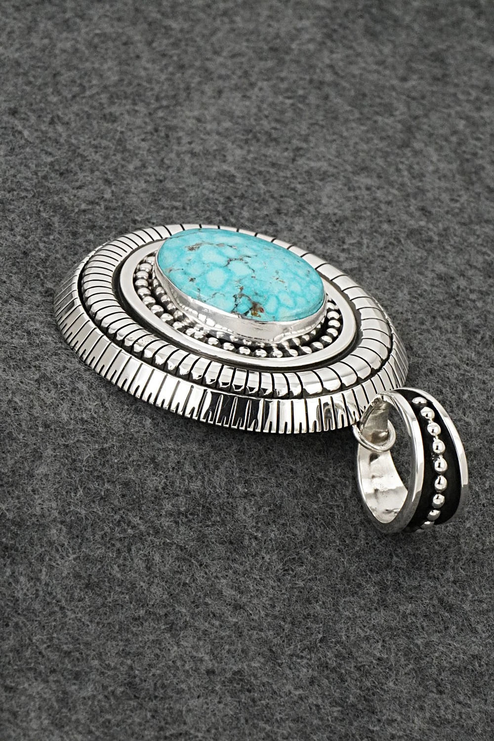 Turquoise and Sterling Silver Pendant - Jonathan Nez