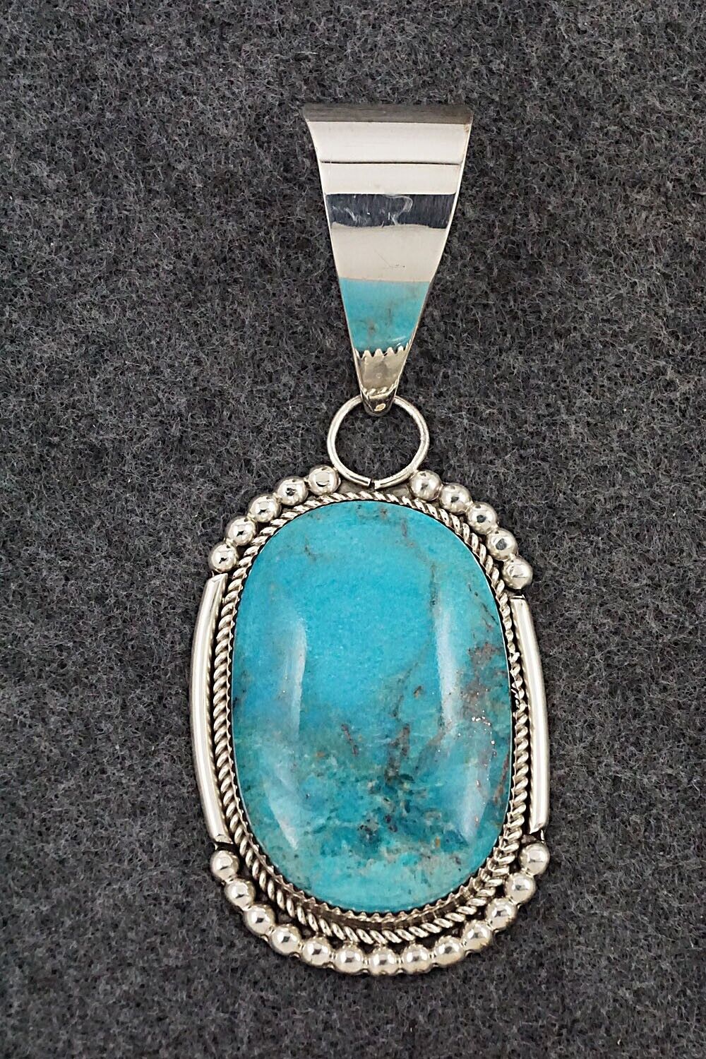 Turquoise & Sterling Silver Pendant - Kenny Calavaza