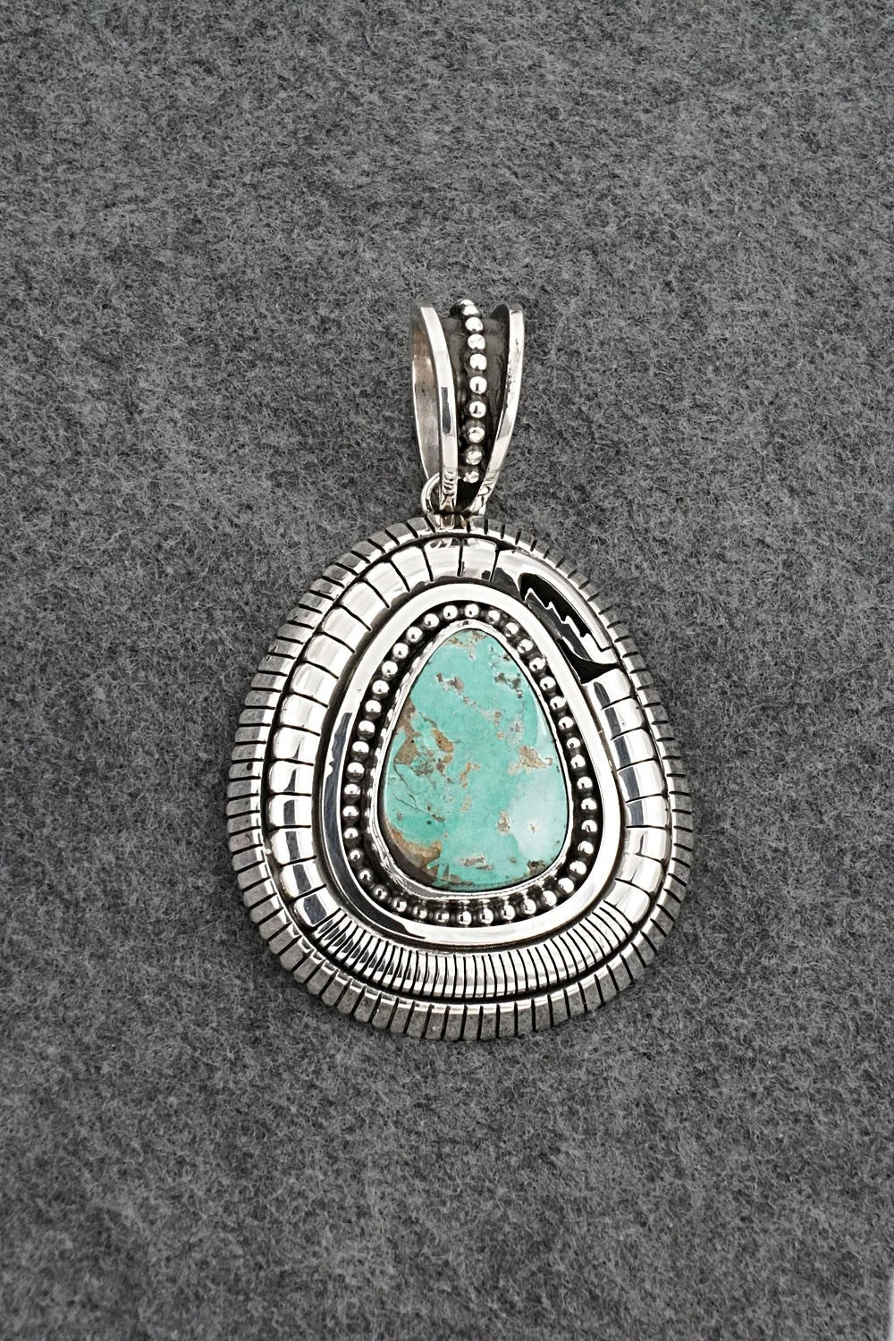 Turquoise and Sterling Silver Pendant - Jonathan Nez