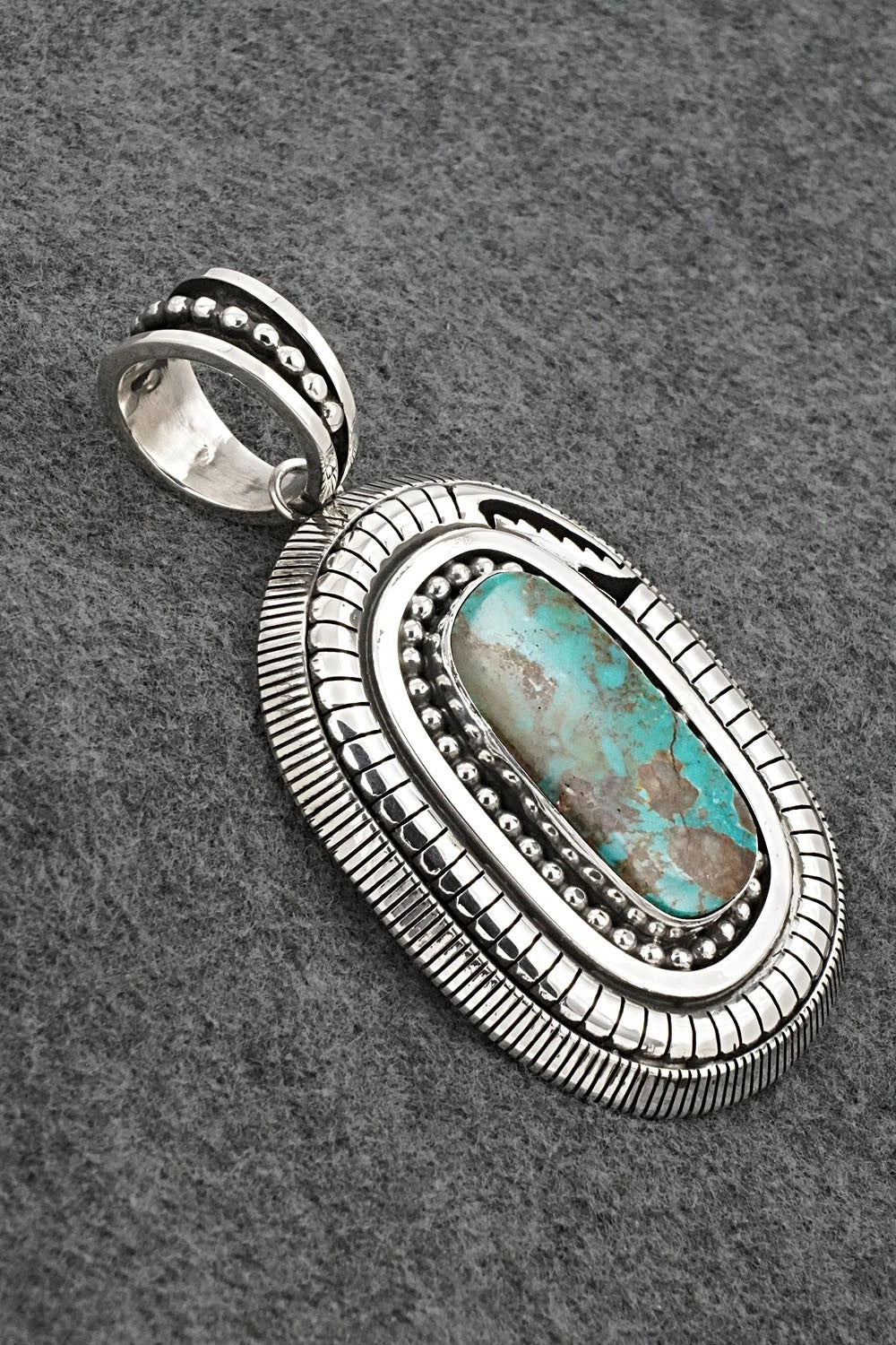 Turquoise and Sterling Silver Pendant - Jonathan Nez
