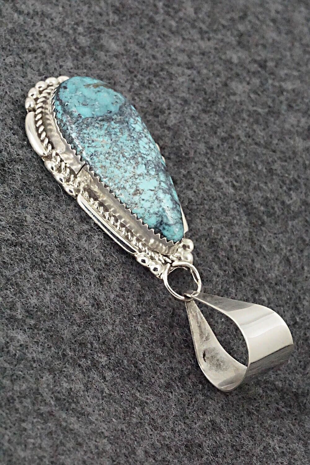 Turquoise & Sterling Silver Pendant - Kenny Calavaza