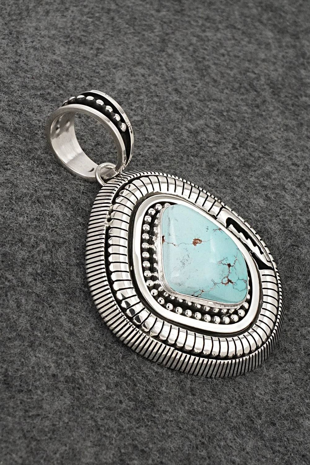 Turquoise and Sterling Silver Pendant - Jonathan Nez