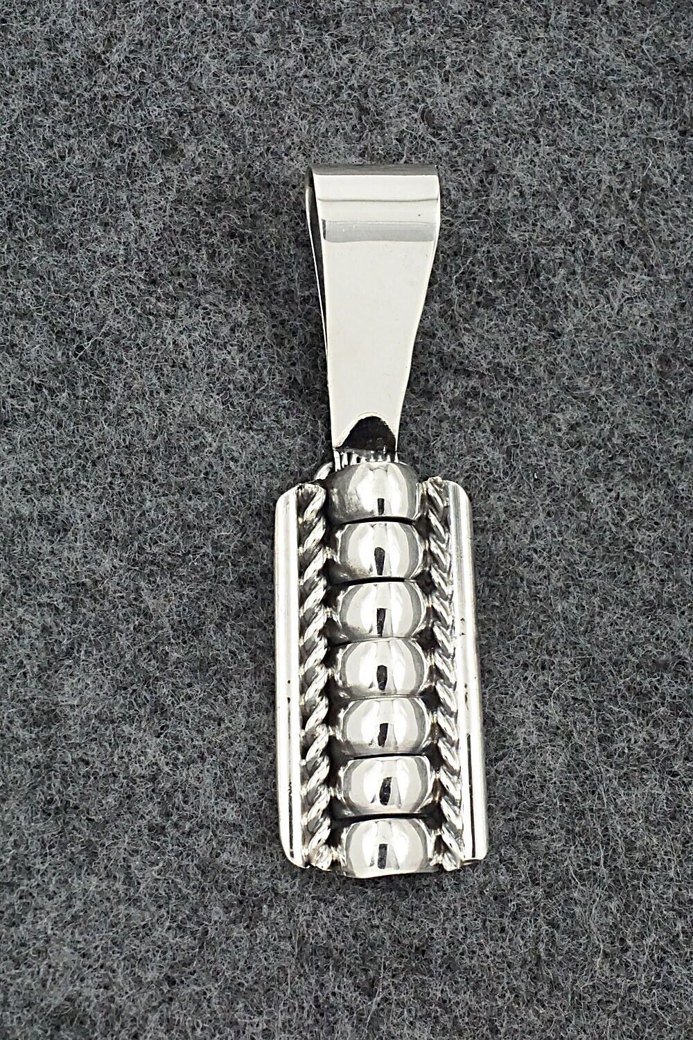 Sterling Silver Pendant - Manuel Johnson