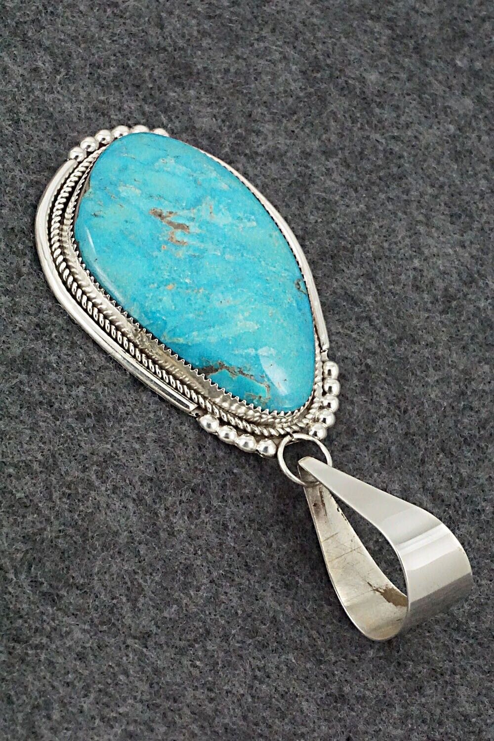 Turquoise & Sterling Silver Pendant - Kenny Calavaza