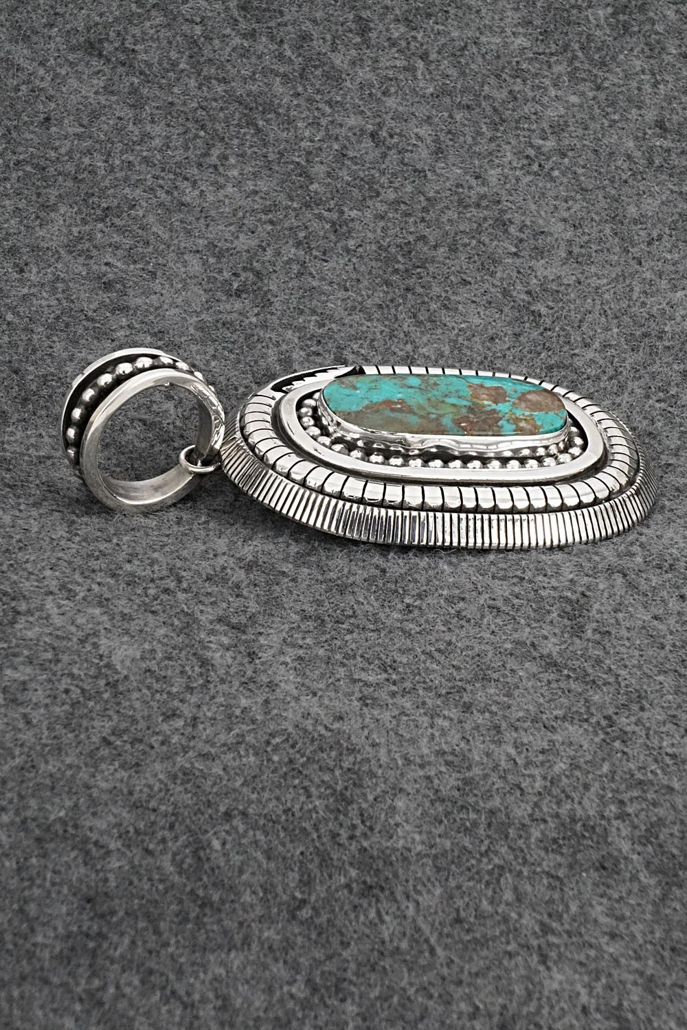 Turquoise and Sterling Silver Pendant - Jonathan Nez