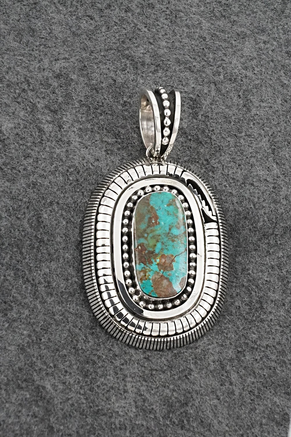 Turquoise and Sterling Silver Pendant - Jonathan Nez