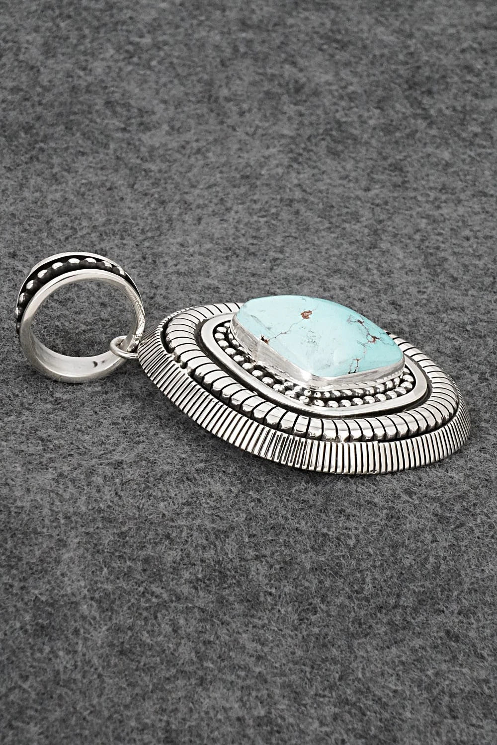 Turquoise and Sterling Silver Pendant - Jonathan Nez
