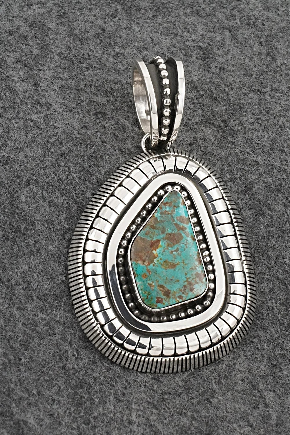 Turquoise and Sterling Silver Pendant - Jonathan Nez