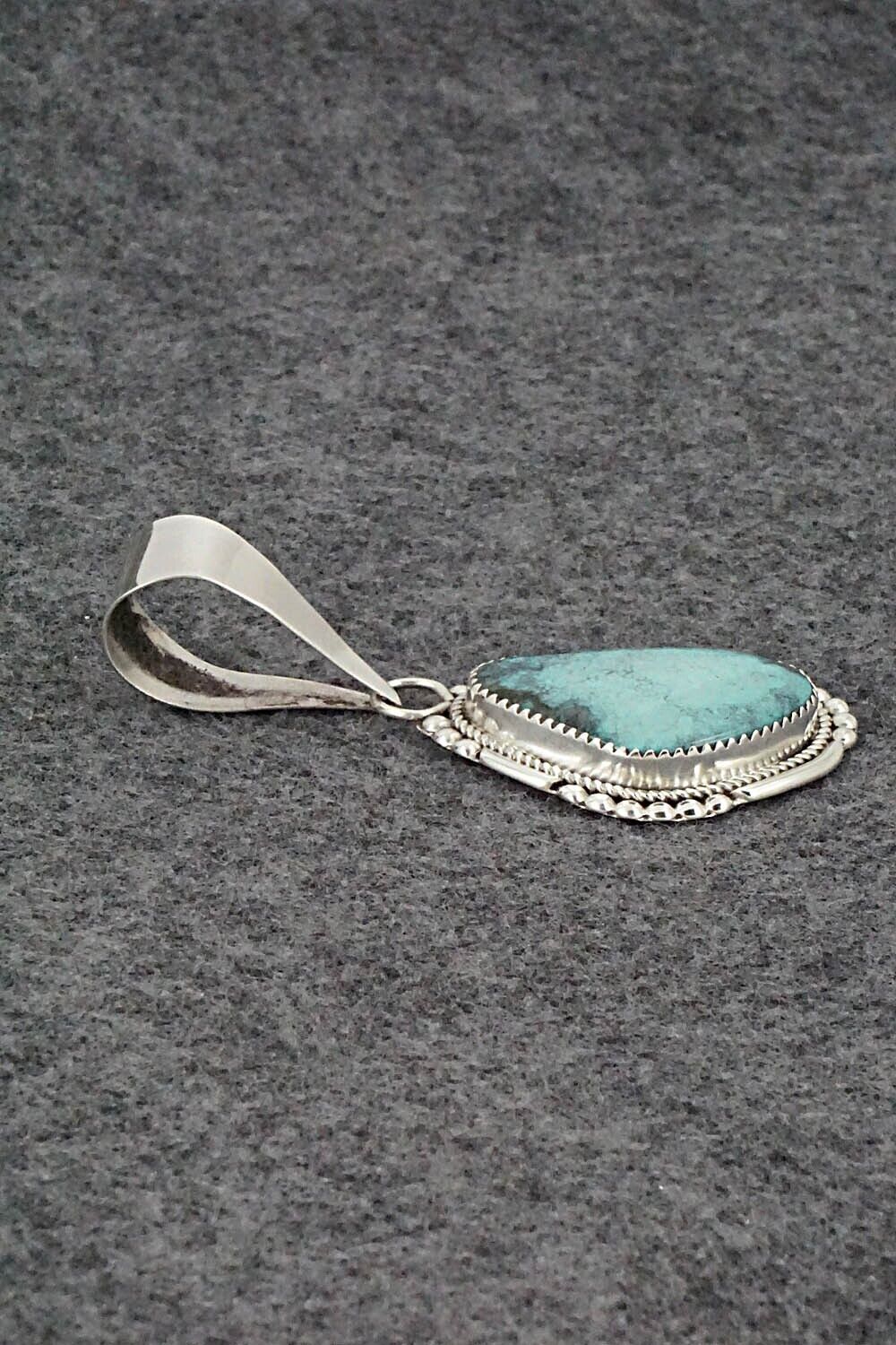 Turquoise & Sterling Silver Pendant - Kenny Calavaza