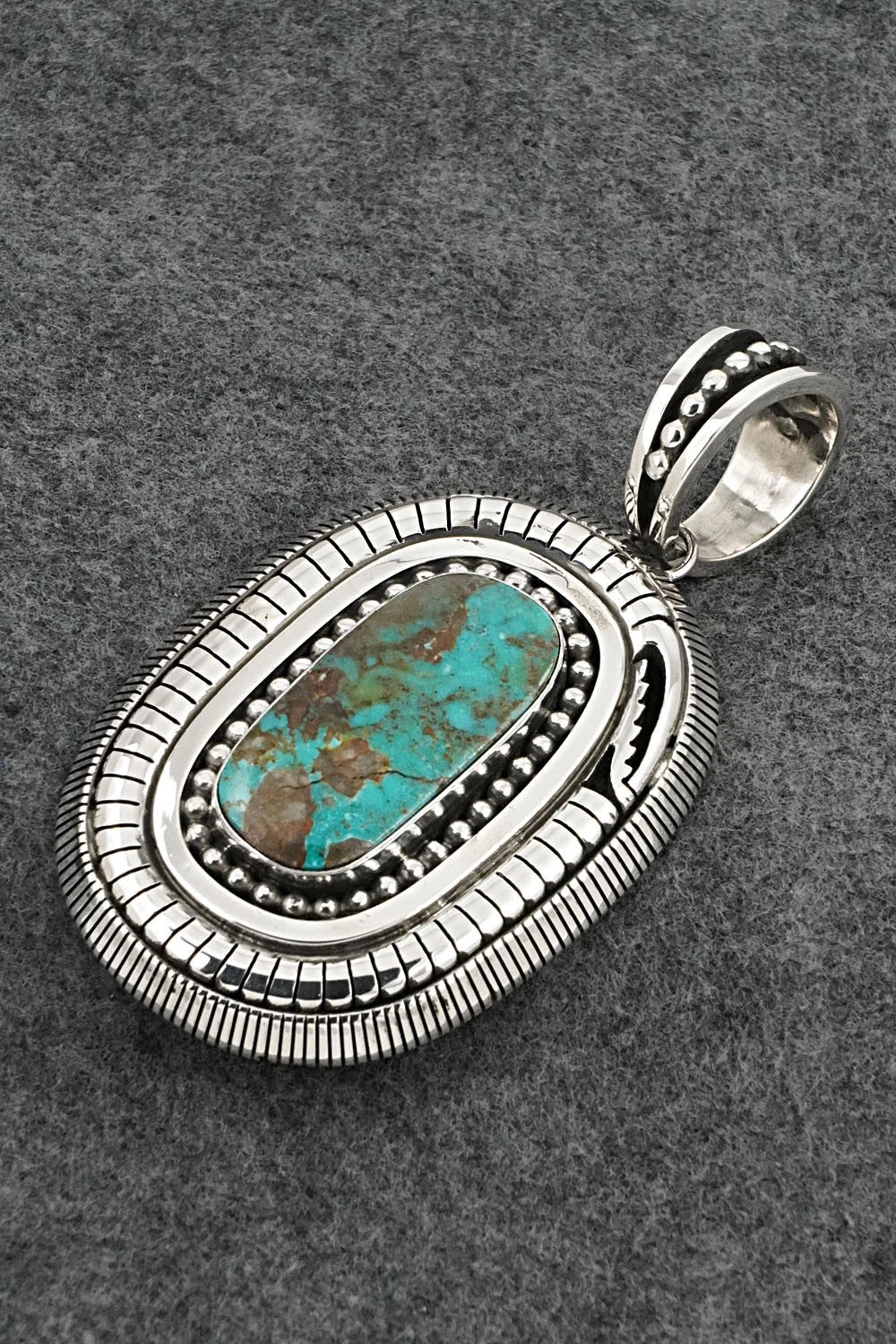 Turquoise and Sterling Silver Pendant - Jonathan Nez