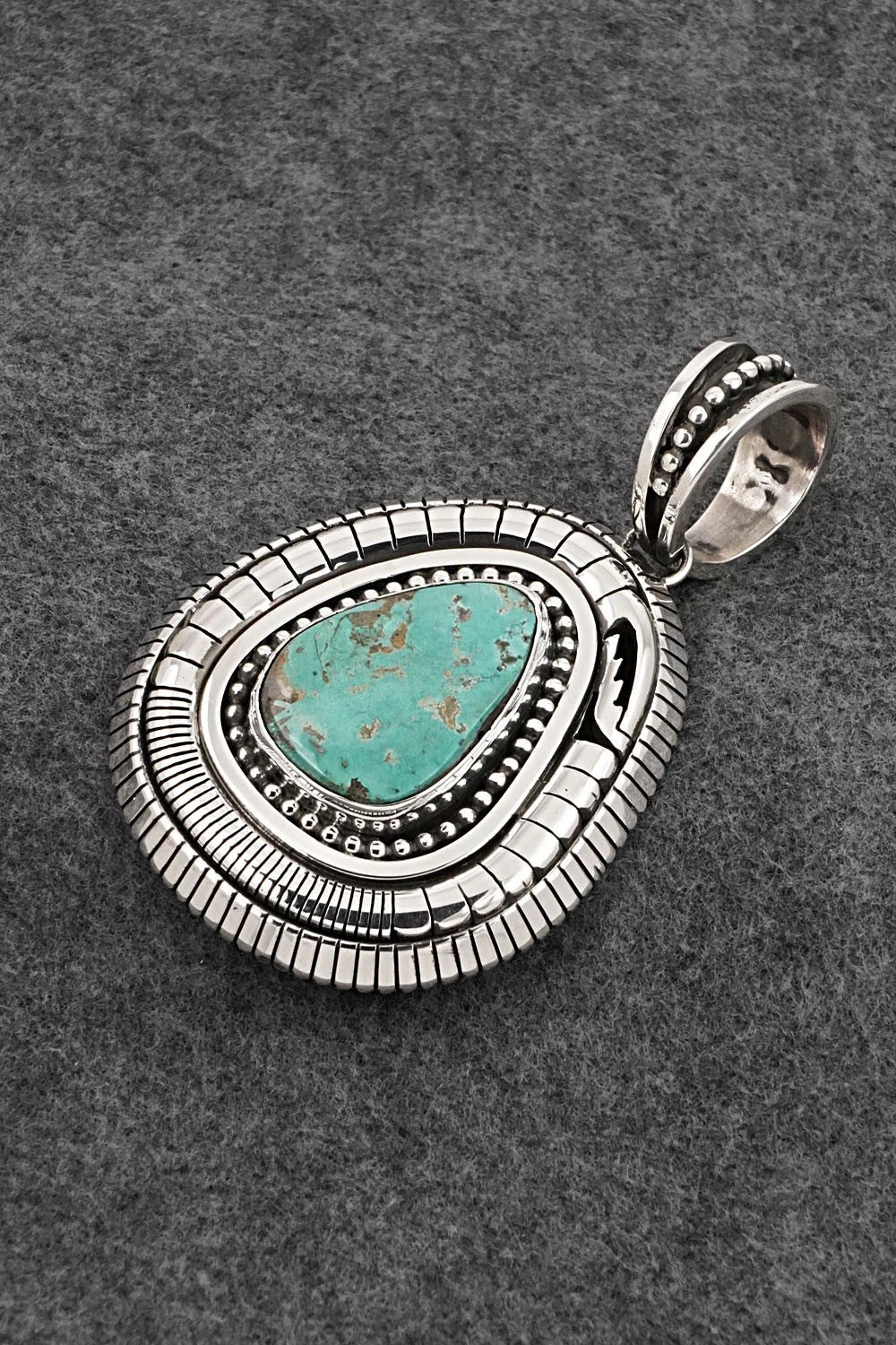 Turquoise and Sterling Silver Pendant - Jonathan Nez