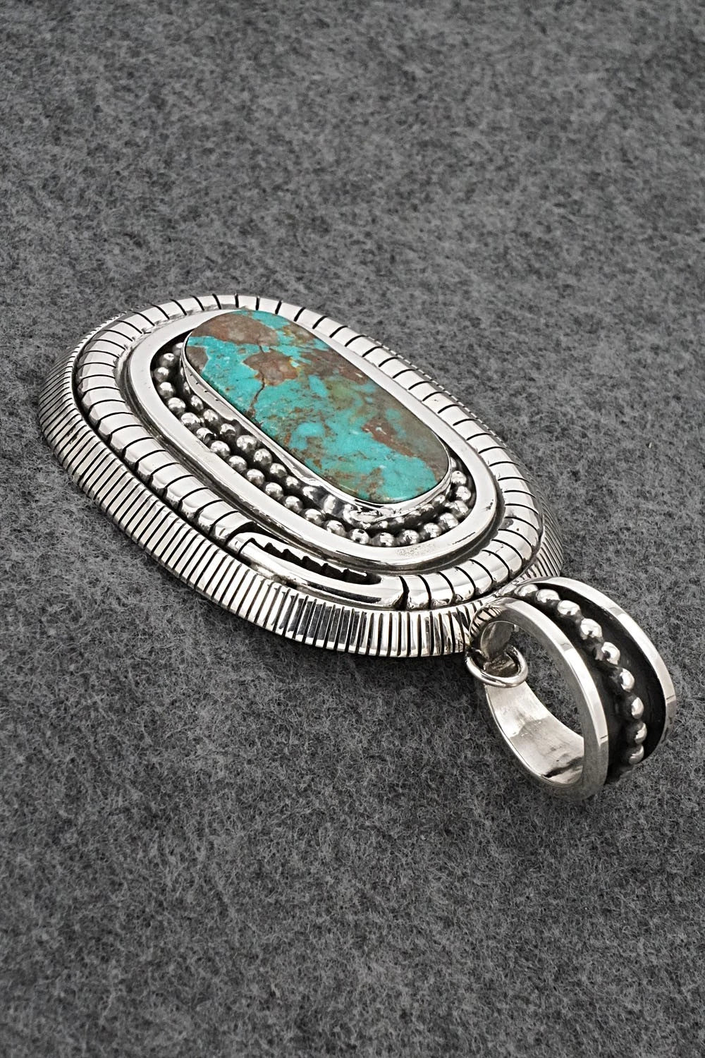 Turquoise and Sterling Silver Pendant - Jonathan Nez