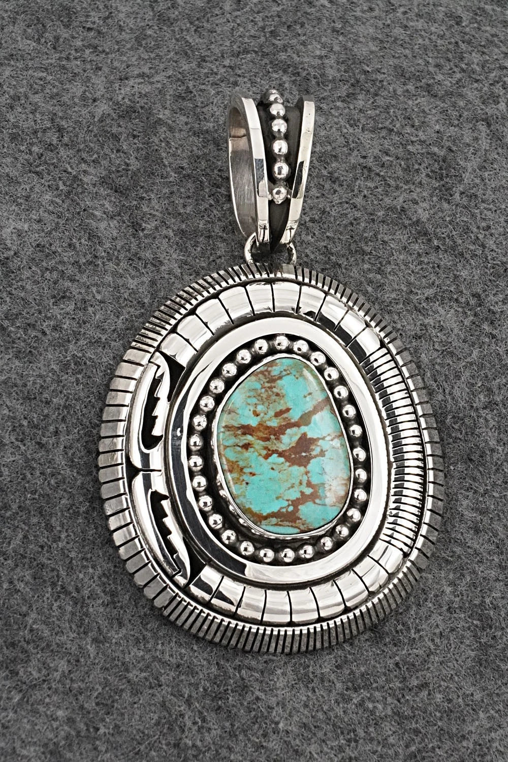 Turquoise and Sterling Silver Pendant - Jonathan Nez
