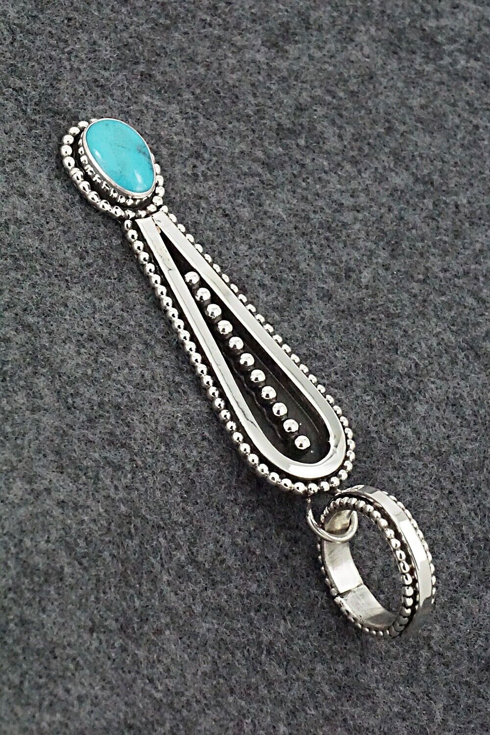 Turquoise & Sterling Silver Pendant - Jonathan Nez