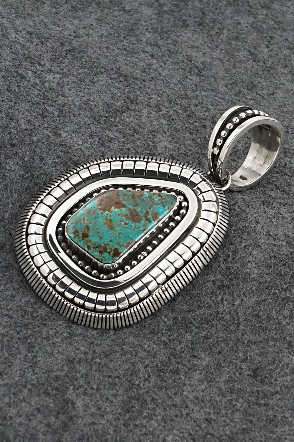 Turquoise and Sterling Silver Pendant - Jonathan Nez