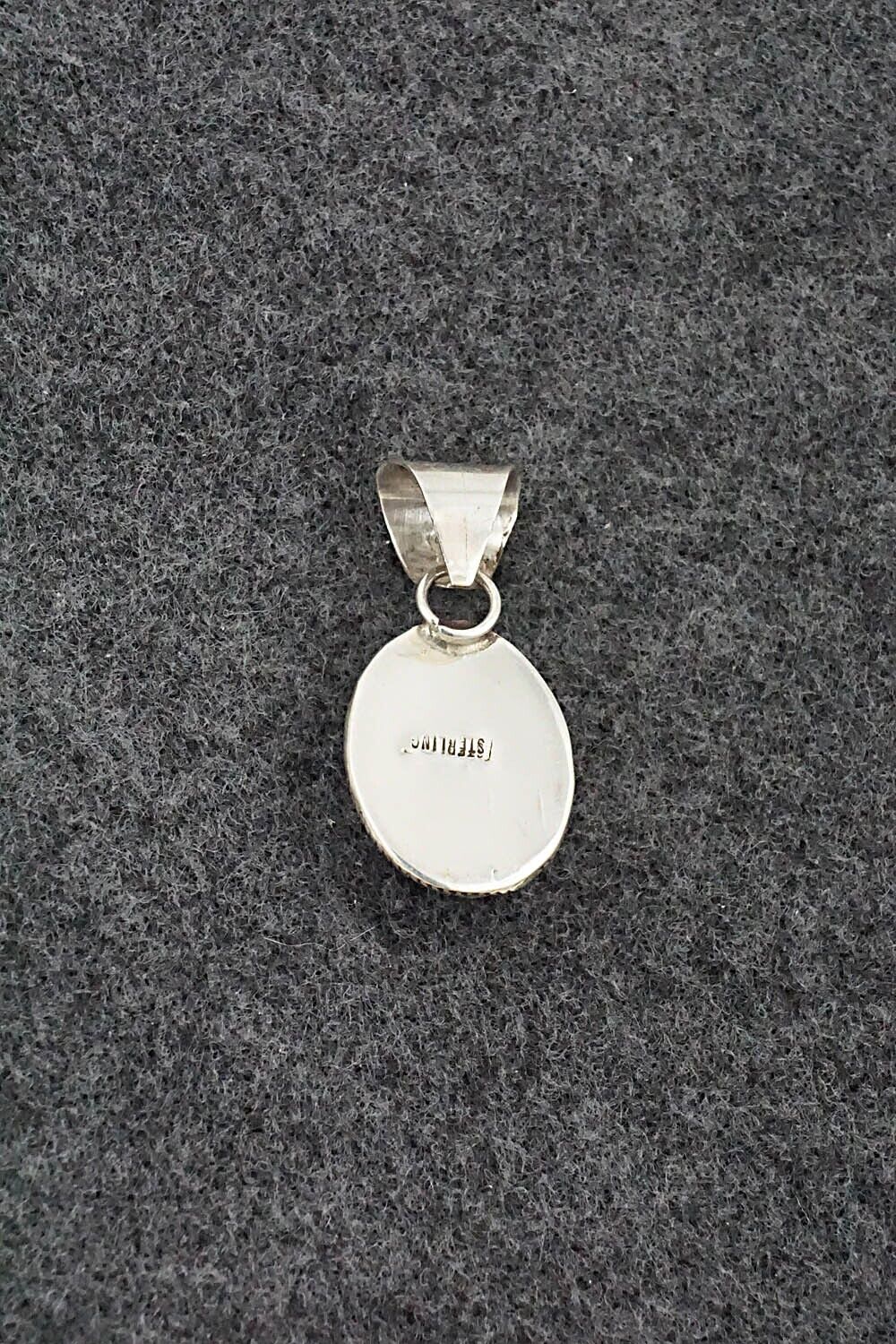 White Buffalo & Sterling Silver Pendant - Ernest Hawthorne