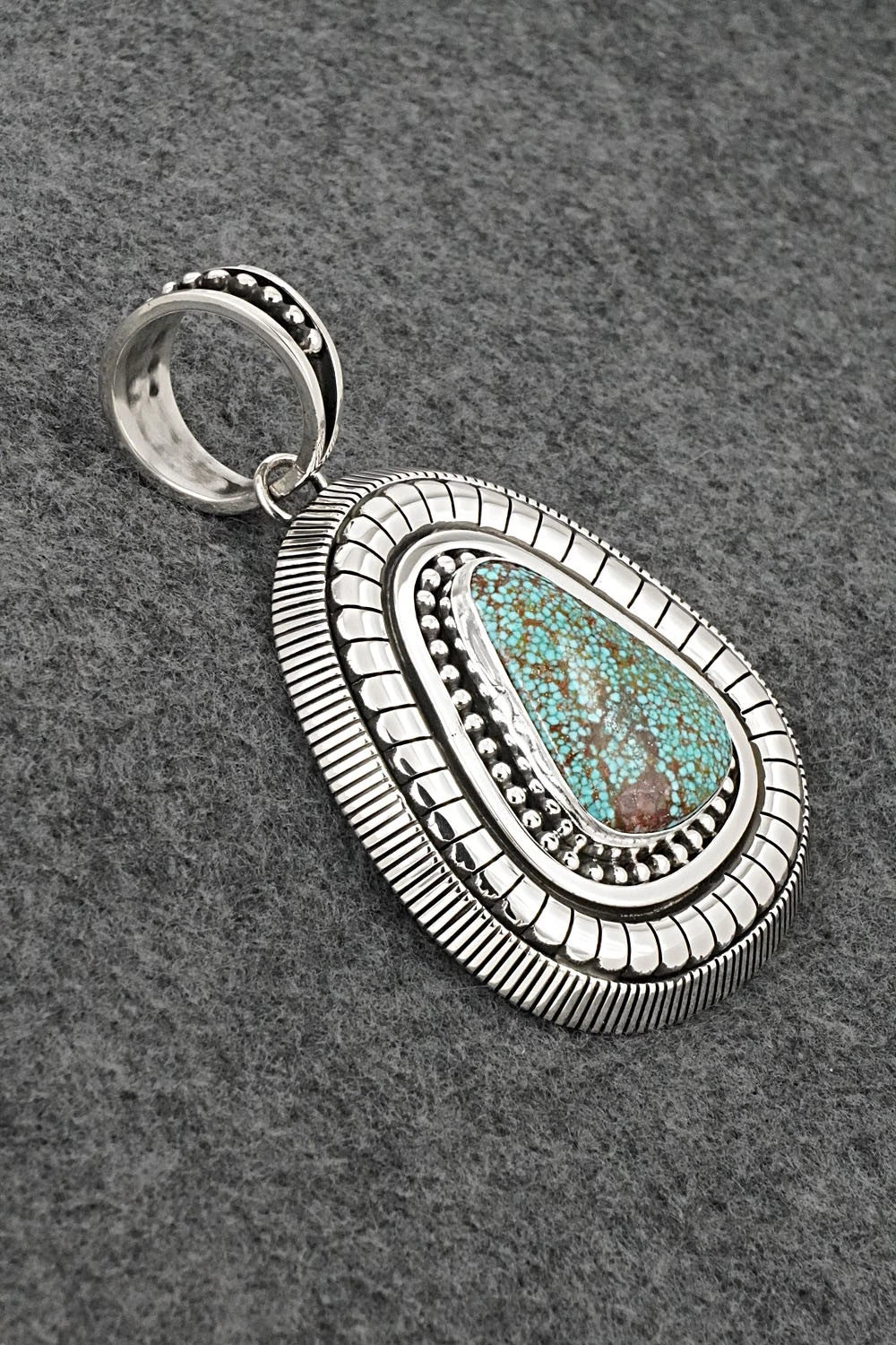 Turquoise and Sterling Silver Pendant - Jonathan Nez