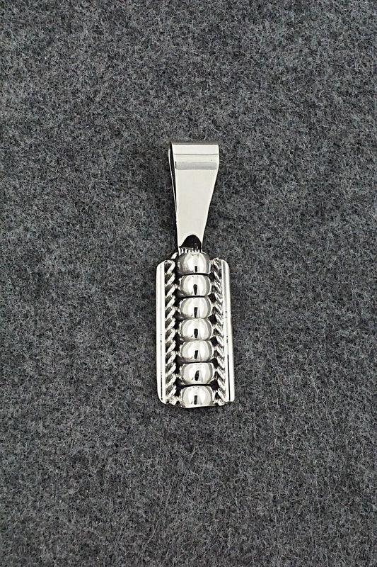 Sterling Silver Pendant - Manuel Johnson