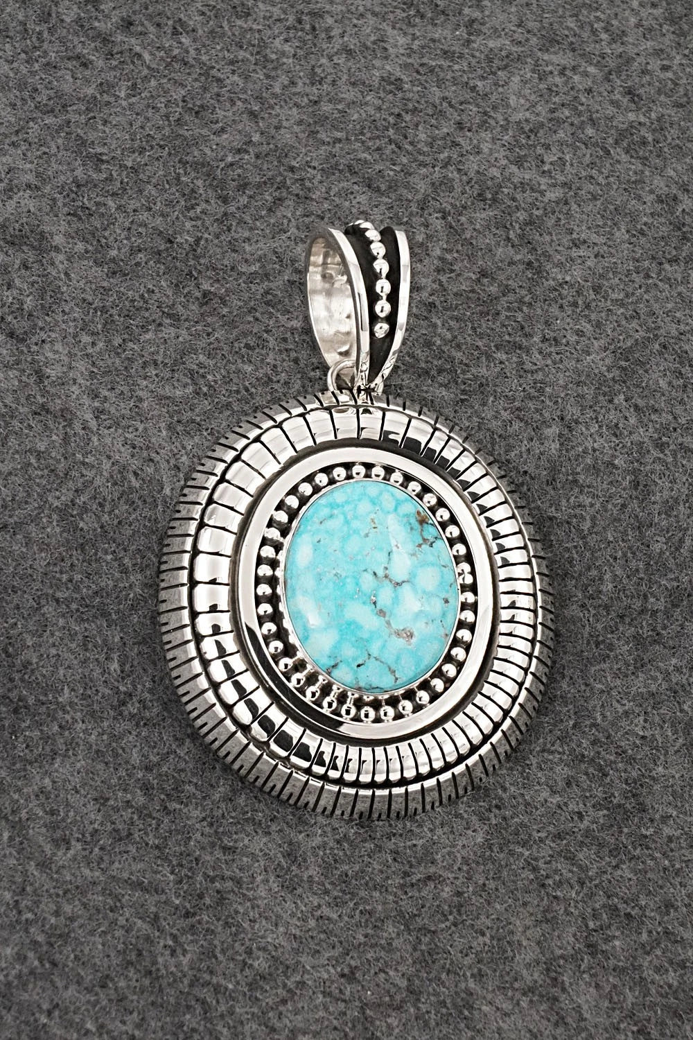 Turquoise and Sterling Silver Pendant - Jonathan Nez