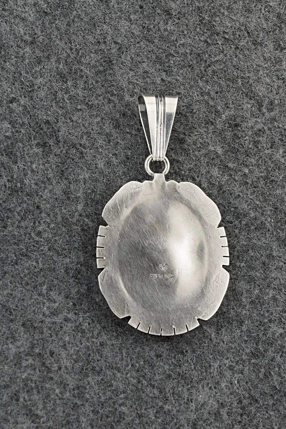 White Buffalo & Sterling Silver Pendant - Samuel Yellowhair