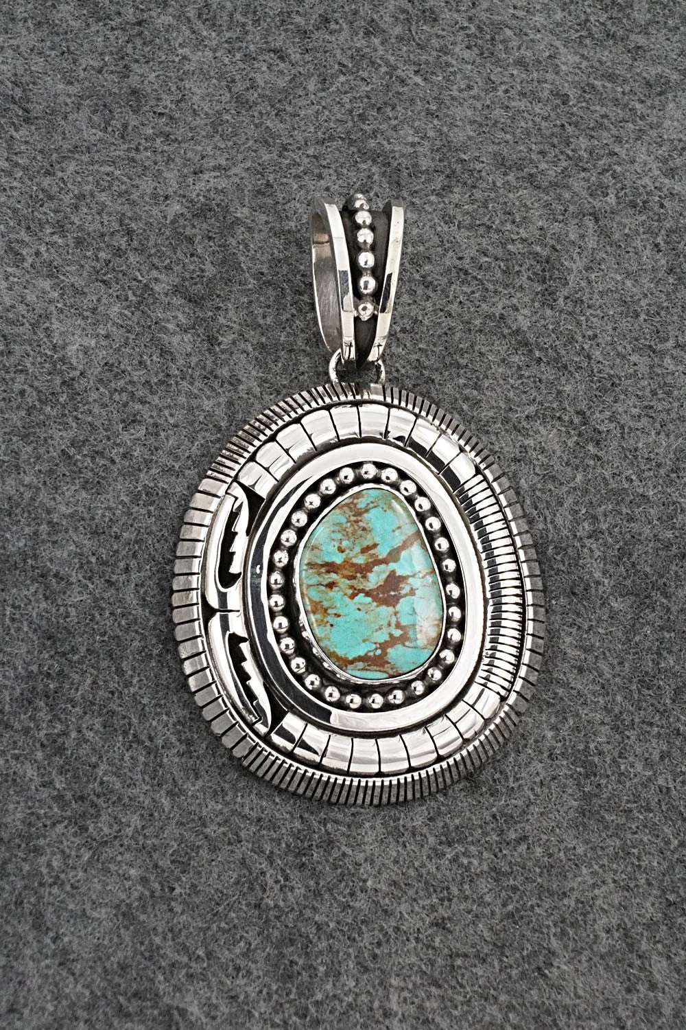 Turquoise and Sterling Silver Pendant - Jonathan Nez