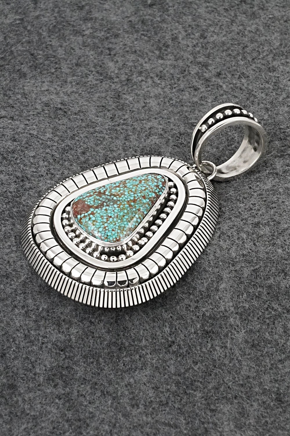 Turquoise and Sterling Silver Pendant - Jonathan Nez