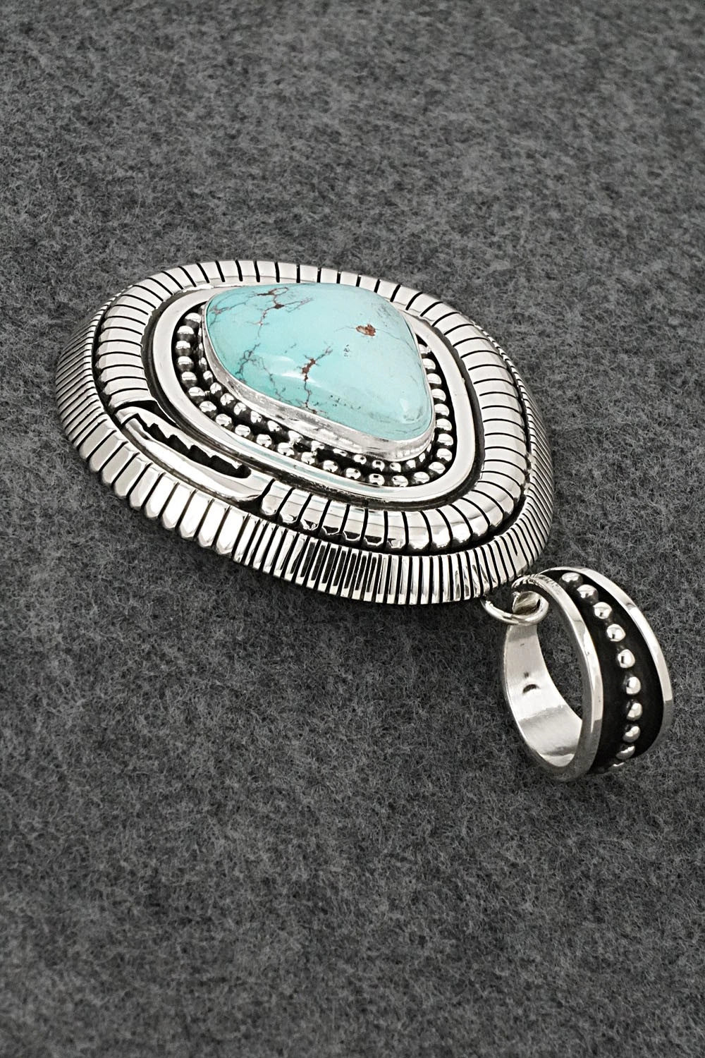 Turquoise and Sterling Silver Pendant - Jonathan Nez