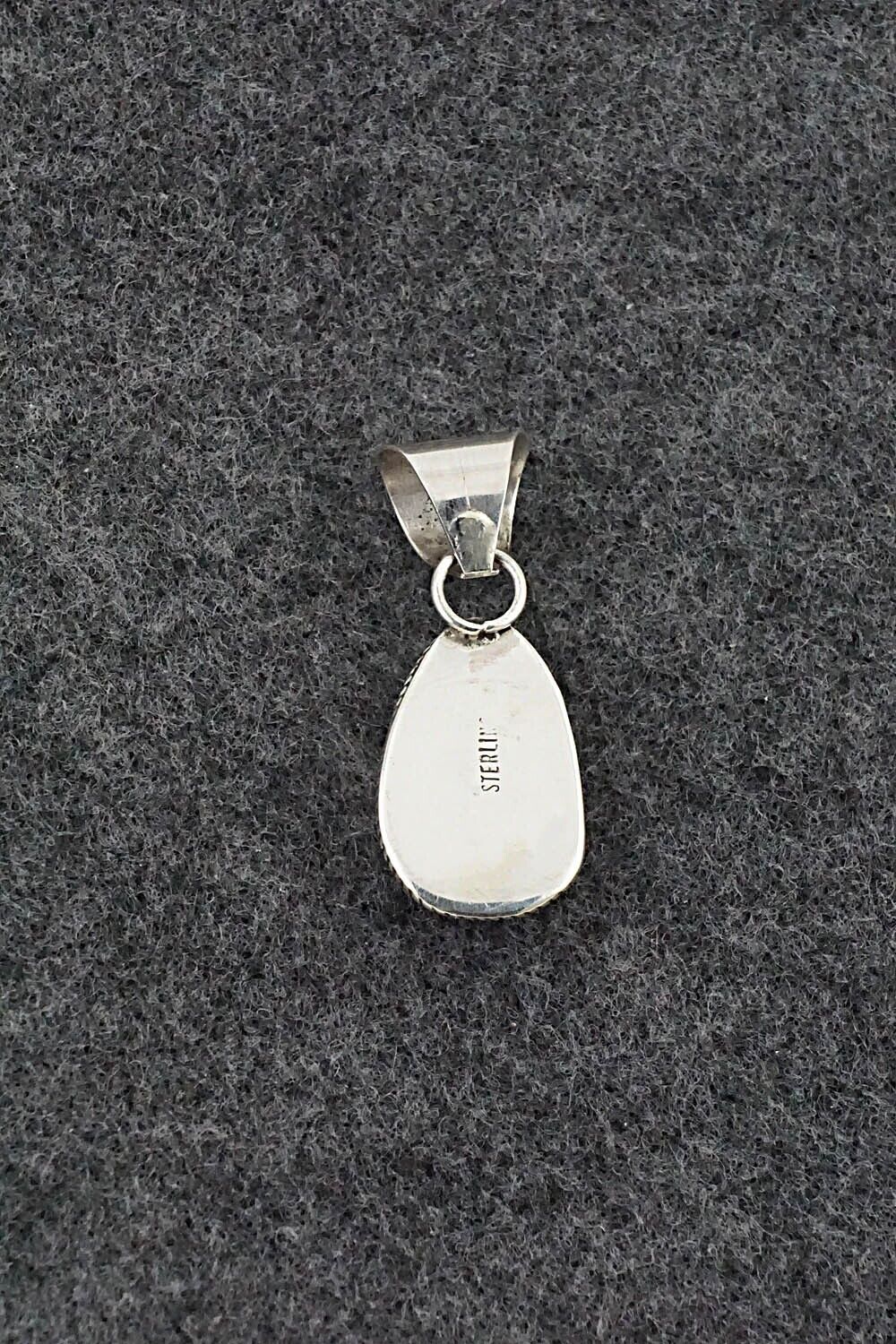 White Buffalo & Sterling Silver Pendant - Ernest Hawthorne
