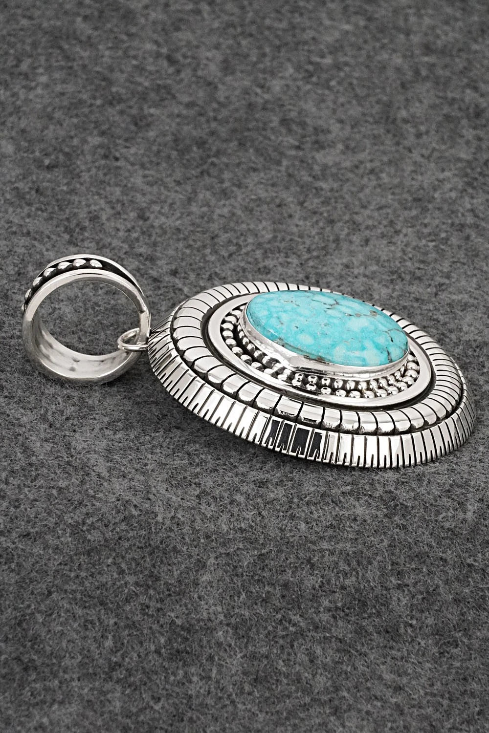 Turquoise and Sterling Silver Pendant - Jonathan Nez