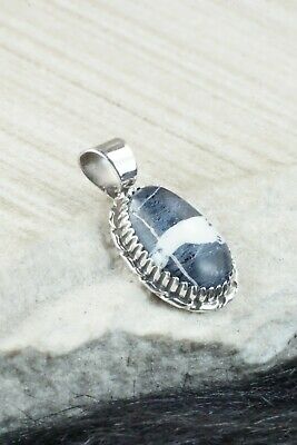 White Buffalo & Sterling Silver Pendant - Alvin Joe