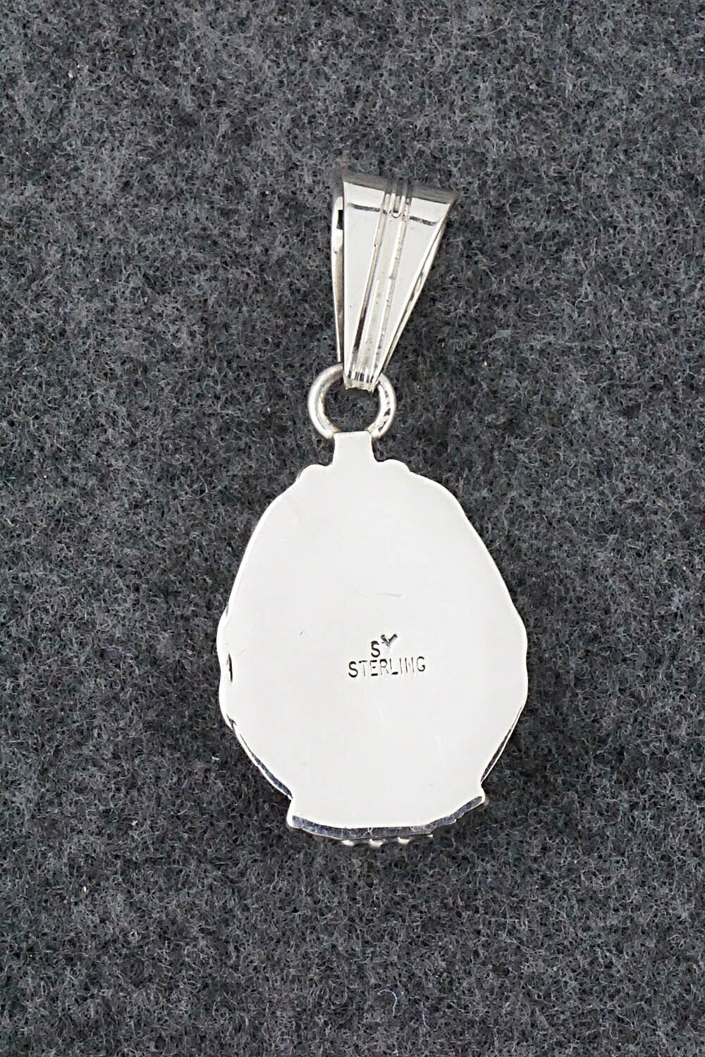 White Buffalo & Sterling Silver Pendant - Samuel Yellowhair