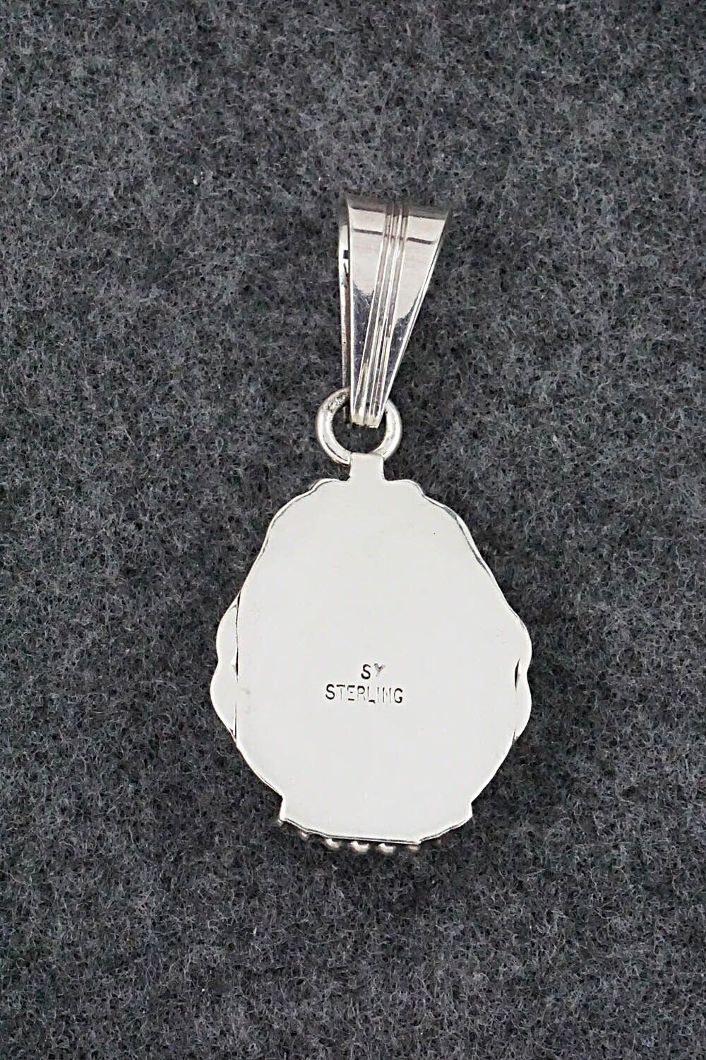 White Buffalo & Sterling Silver Pendant - Samuel Yellowhair