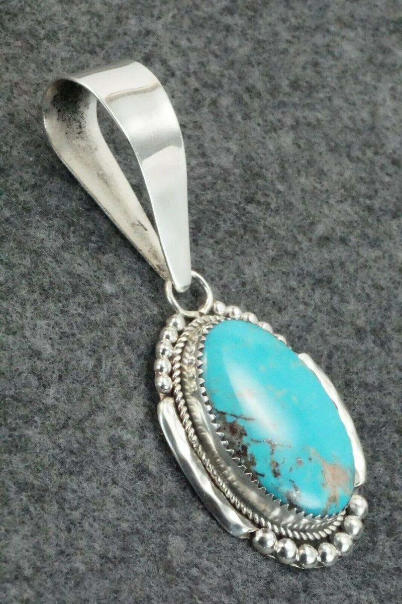 Turquoise and Sterling Silver Pendant - Kenny Calavaza