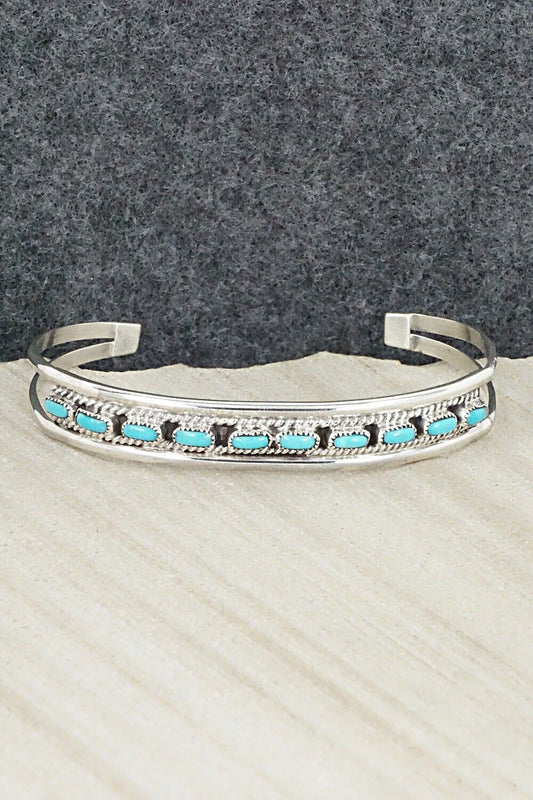 Turquoise & Sterling Silver Bracelet - Eldrick Seoatwa
